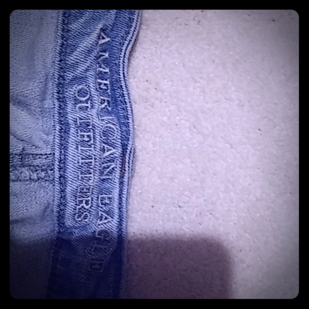 Womens very distressed light denim American Eagle